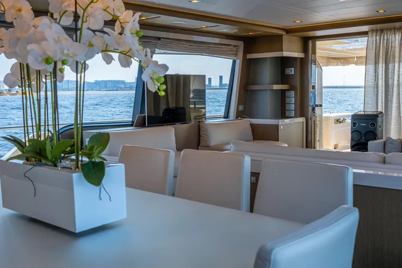  Yacht Photos Pics Luxurious interior of 2013 Ferretti Yachts 870 with elegant dining area and sea view.