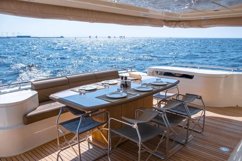  Yacht Photos Pics Luxury dining area on 2013 Ferretti Yachts 870 with ocean view.