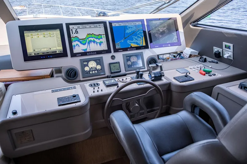  Yacht Photos Pics Helm of 2013 Ferretti Yachts 870 with advanced navigation displays and controls.