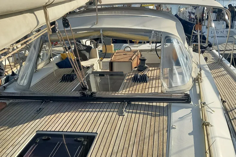 Southern Cross Yacht Photos Pics 2015 Dufour 560 Grand Large yacht deck with canopy and seating area.