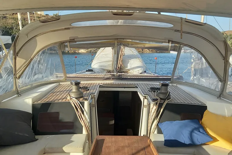 Southern Cross Yacht Photos Pics Cockpit view of 2015 Dufour 560 Grand Large yacht with cushions and open hatch.
