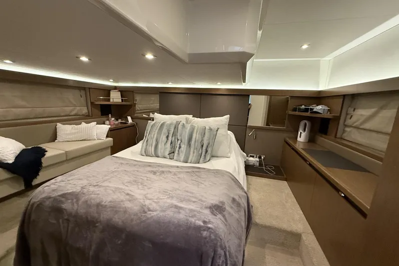  Yacht Photos Pics Luxurious 2018 Sea Ray Sundancer 460 yacht cabin with cozy bed and modern decor.