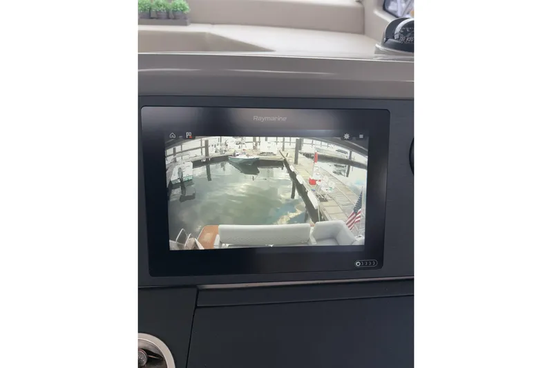  Yacht Photos Pics 2018 Sea Ray Sundancer 460 dashboard with Raymarine display showing dock view.