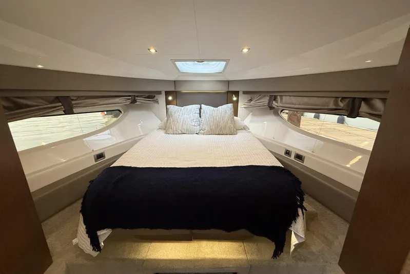 Yacht Photos Pics Luxurious 2018 Sea Ray Sundancer 460 yacht bedroom with elegant bedding and ambient lighting.
