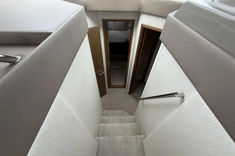  Yacht Photos Pics Interior stairs of 2018 Sea Ray Sundancer 460 yacht, leading to cabin area.