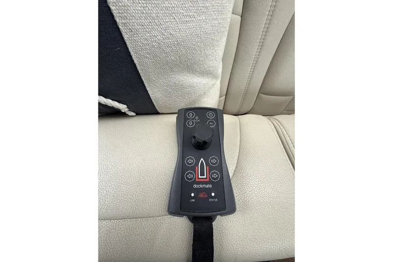  Yacht Photos Pics Remote control on Sea Ray Sundancer 460 yacht's beige leather seat, 2018 model.