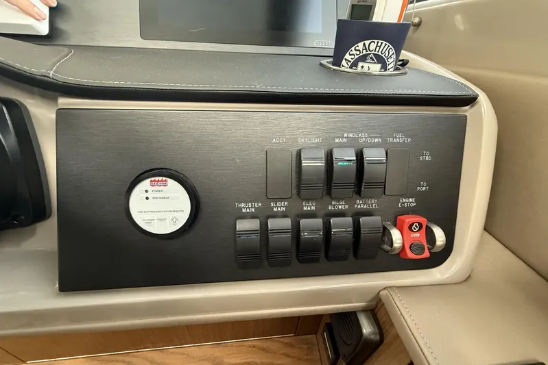  Yacht Photos Pics Control panel of a 2018 Sea Ray Sundancer 460 yacht with various switches and indicators.