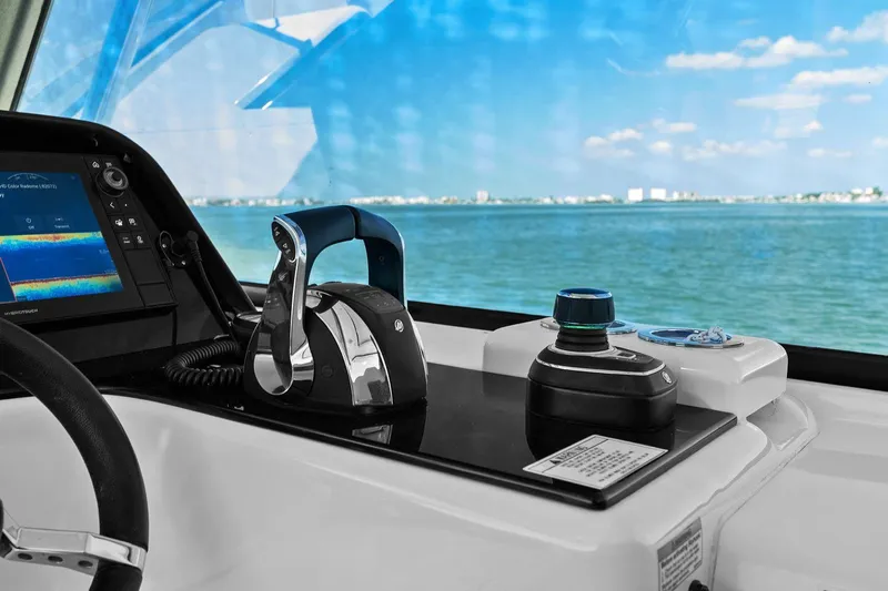  Yacht Photos Pics Control panel of a 2020 Aquila 36 boat with ocean view.