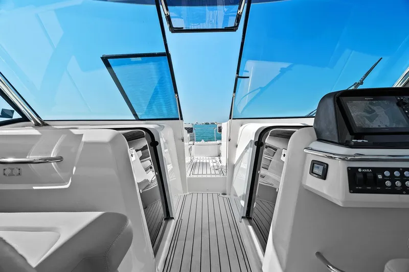  Yacht Photos Pics Interior view of 2020 Aquila 36 yacht with sleek design and modern navigation system.