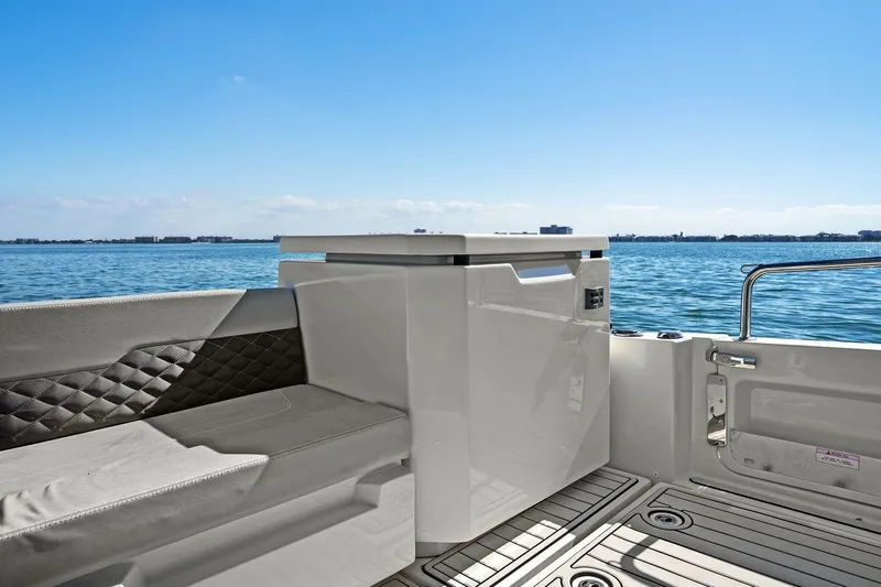  Yacht Photos Pics Aquila 36 boat interior with seating and ocean view, 2020 model.