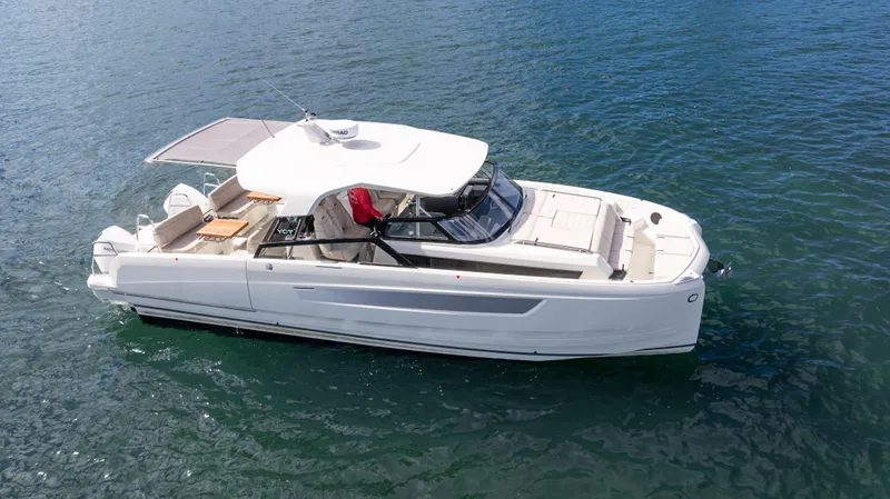  Yacht Photos Pics 2025 YOT 36 boat on calm water, featuring sleek design and spacious deck.