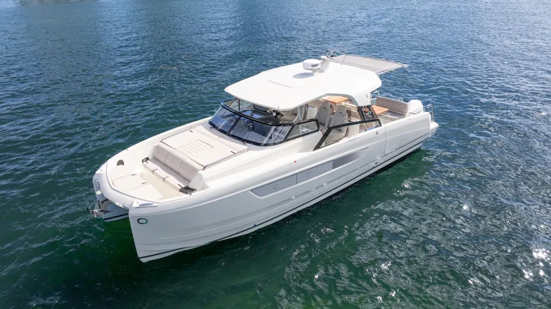  Yacht Photos Pics Luxurious 2025 YOT 36 yacht cruising on serene blue waters.