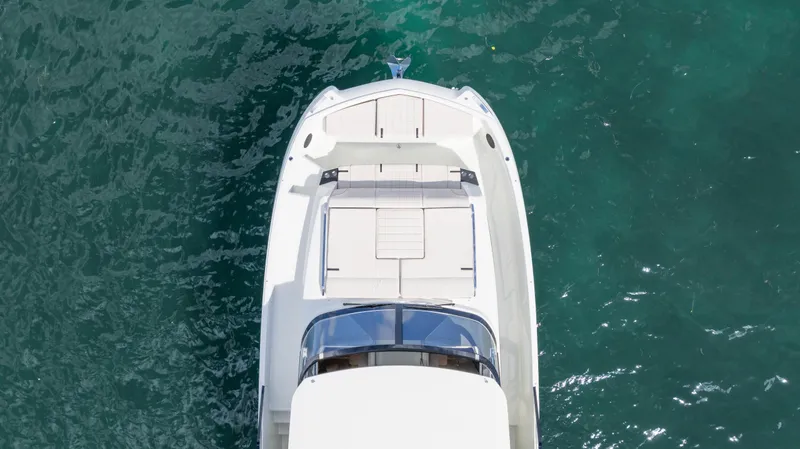 Yacht Photos Pics Top view of a 2025 YOT 36 yacht on clear blue water.