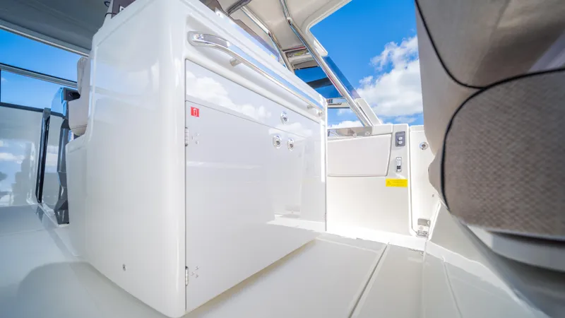  Yacht Photos Pics 2025 YOT 36 boat interior with sleek white cabinetry and modern design.