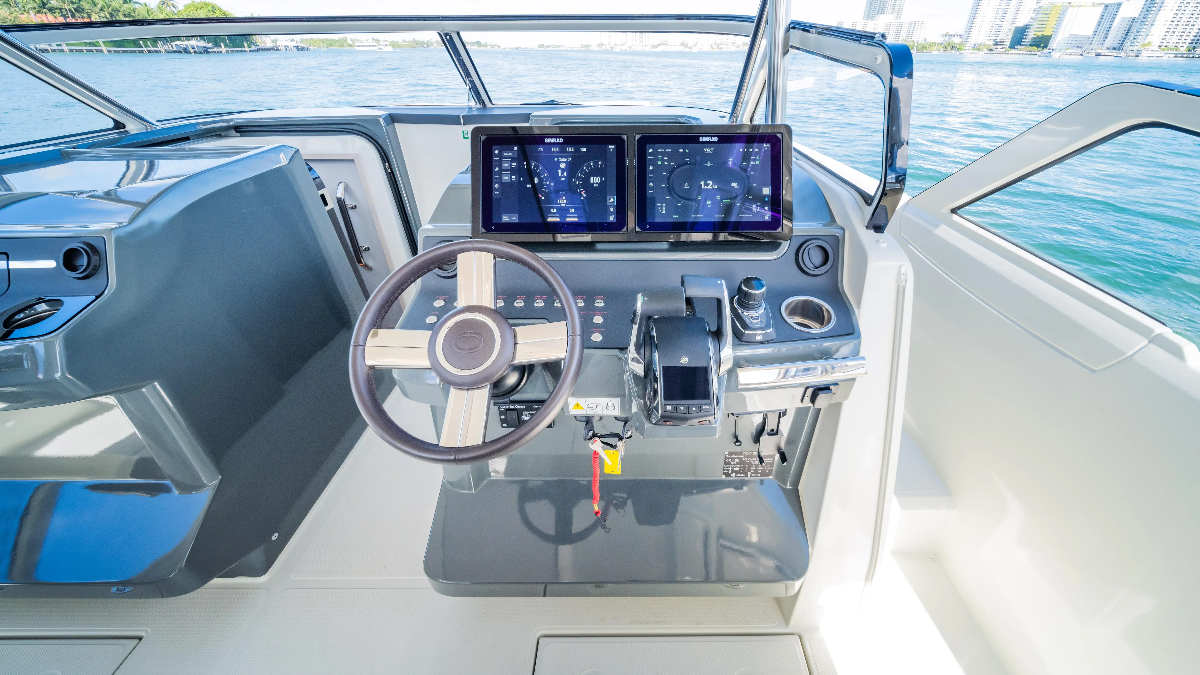  Yacht Photos Pics Helm of 2025 YOT 36 boat with dual screens and modern controls.