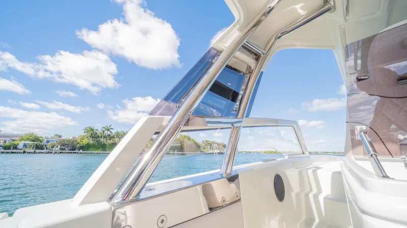  Yacht Photos Pics 2025 YOT 36 boat interior with scenic water view and clear blue sky.