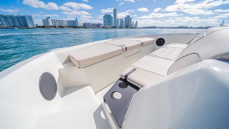  Yacht Photos Pics Luxurious YOT 36 boat interior with city skyline, 2025 model.