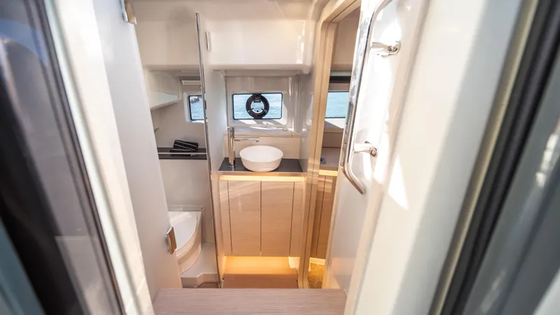  Yacht Photos Pics Modern bathroom interior on 2025 YOT 36 yacht, featuring sleek design and compact functionality.