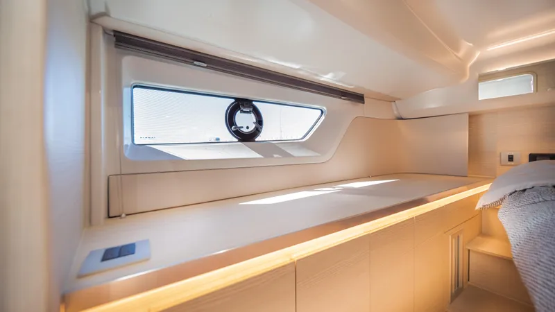  Yacht Photos Pics Modern interior of 2025 YOT 36 yacht with sleek design and natural lighting.