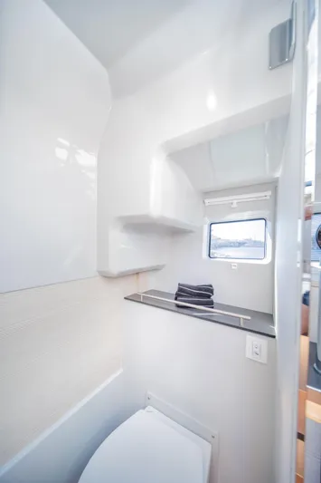  Yacht Photos Pics Modern bathroom interior in 2025 YOT 36 yacht, featuring sleek design and compact functionality.