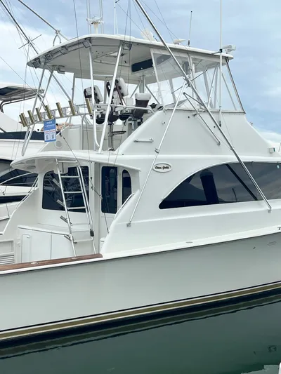 Series 60, Repainted Yacht Photos Pics Ocean Yachts 48 Convertible 2000, luxury white yacht docked in harbor.