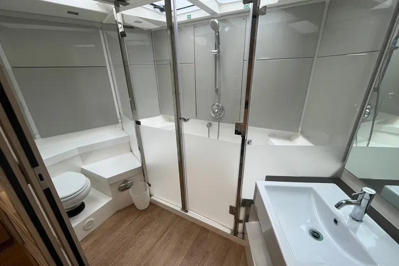  Yacht Photos Pics Luxurious bathroom in 2012 Fairline Targa 58 Gran Turismo yacht, featuring modern fixtures and elegant design.