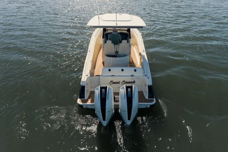 Our Trade Yacht Photos Pics 2019 Chris-Craft Catalina 30 boat on water, rear view with dual engines.