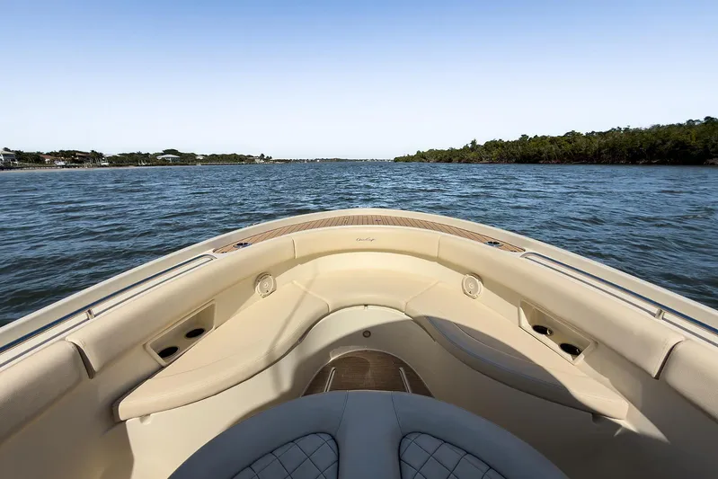 Our Trade Yacht Photos Pics 2019 Chris-Craft Catalina 30 boat cruising on a serene waterway.