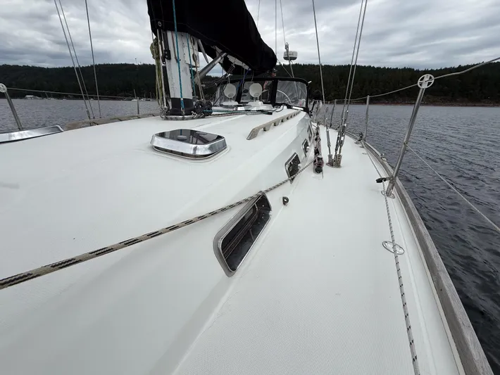 Ulrica Yacht Photos Pics Sailing yacht Sabre 402, 1997 model, on calm waters under cloudy skies.
