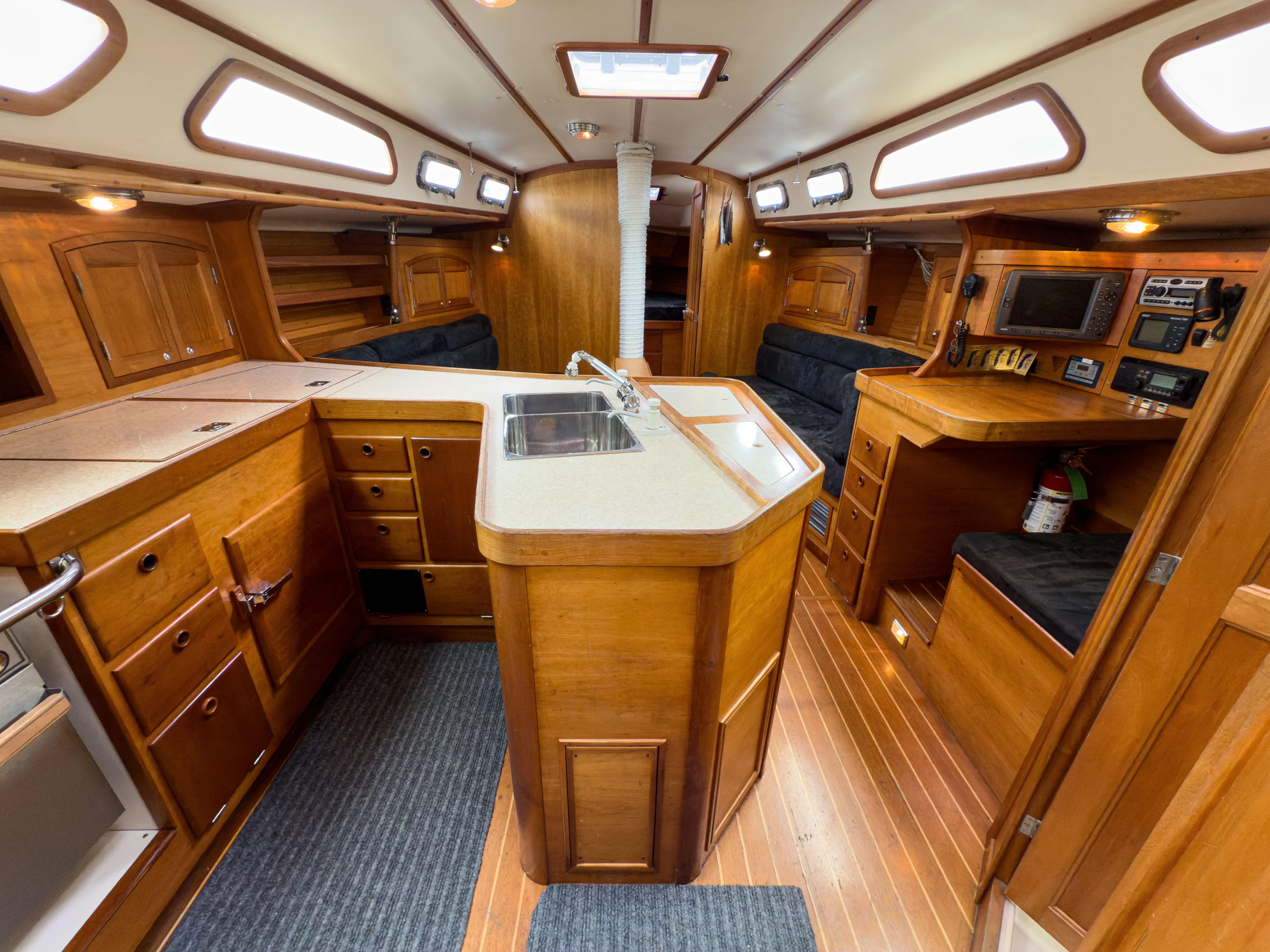 Ulrica Yacht Photos Pics Spacious interior of 1997 Sabre 402 sailboat with wooden cabinetry and modern amenities.