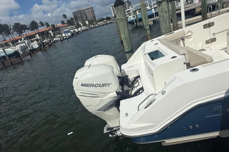 Dulce Vita Yacht Photos Pics 2016 Boston Whaler 330 Outrage with Mercury engine docked at marina.