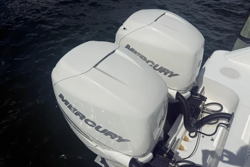 Dulce Vita Yacht Photos Pics Twin Mercury outboard engines on a 2016 Boston Whaler 330 Outrage boat.