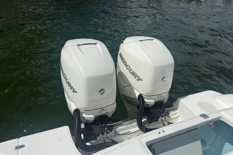 Dulce Vita Yacht Photos Pics Twin Mercury outboard engines on a 2016 Boston Whaler 330 Outrage boat.