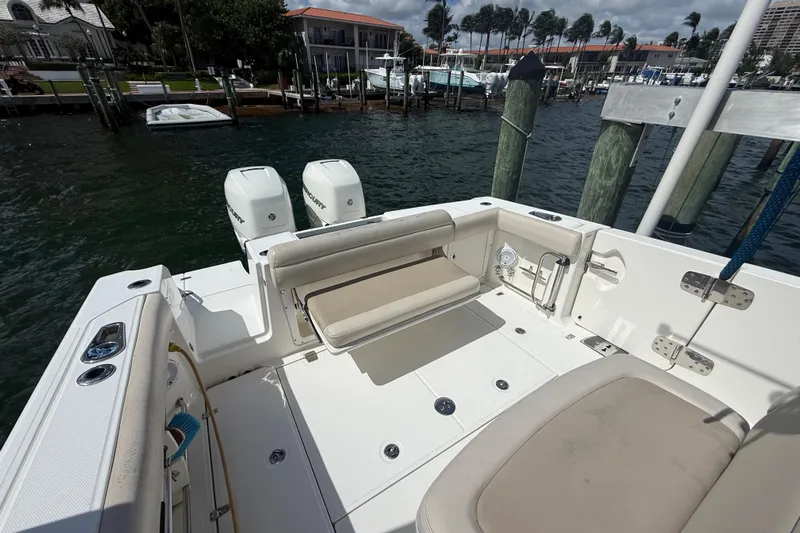 Dulce Vita Yacht Photos Pics 2016 Boston Whaler 330 Outrage boat with dual engines docked at marina.