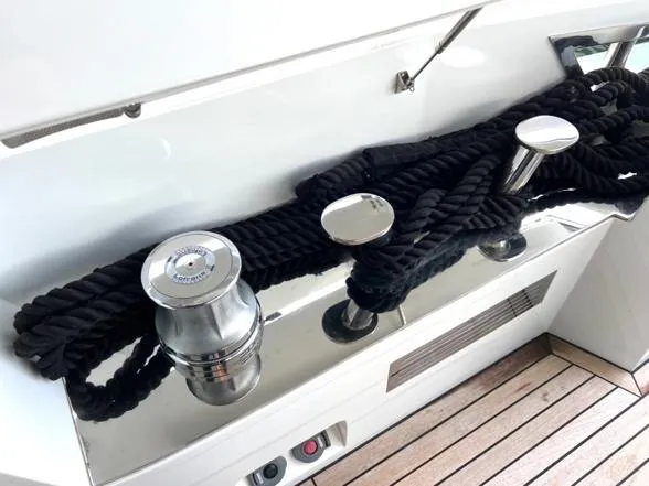 Armaar Yacht Photos Pics Astondoa AS100 Century 2017 yacht deck with polished cleats and black ropes.