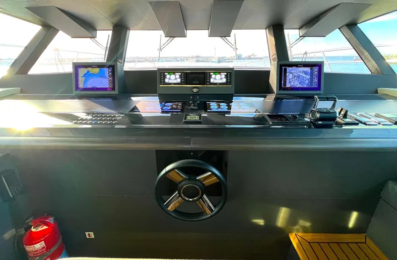 Armaar Yacht Photos Pics Cockpit of 2017 Astondoa AS100 Century yacht with advanced navigation systems.