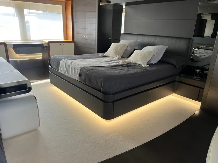 Armaar Yacht Photos Pics Luxurious bedroom interior of 2017 Astondoa AS100 Century yacht with modern design and ambient lighting.