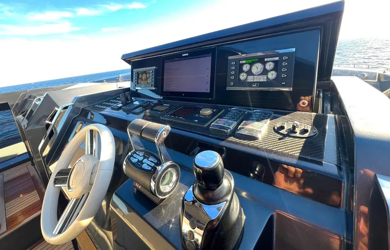 Armaar Yacht Photos Pics Cockpit of 2017 Astondoa AS100 Century yacht with advanced navigation controls and ocean view.