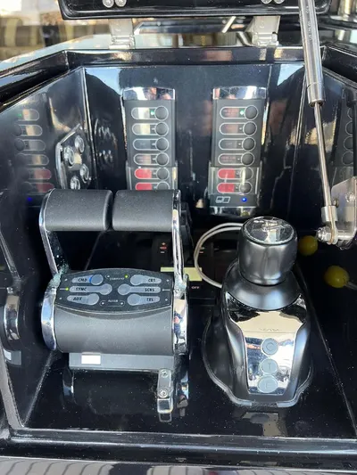 Armaar Yacht Photos Pics Control panel of 2017 Astondoa AS100 Century yacht with throttle and joystick.