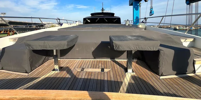 Armaar Yacht Photos Pics Astondoa AS100 Century 2017 yacht deck with covered seating and clear blue sky.