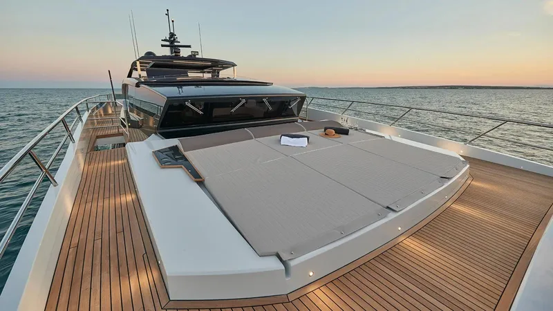 Armaar Yacht Photos Pics Astondoa AS100 Century 2017 yacht with spacious deck at sunset on the ocean.