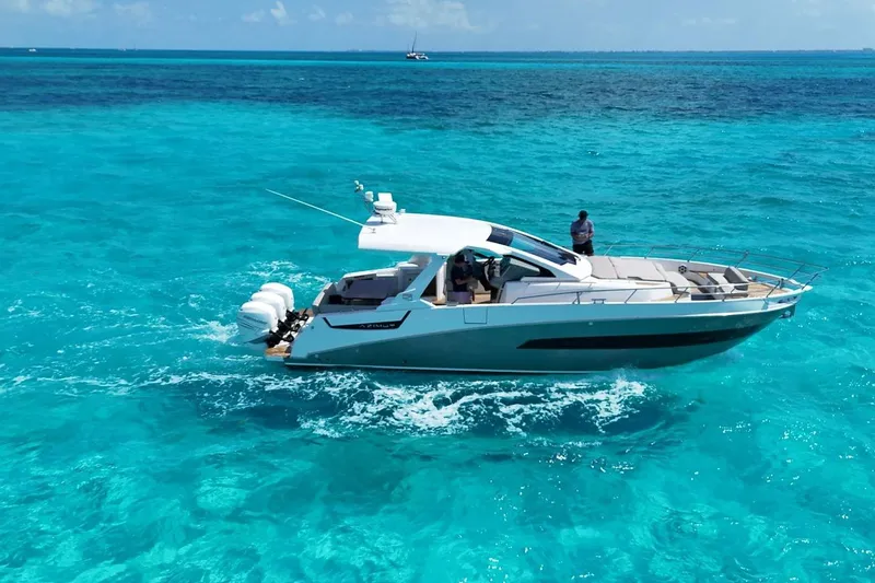 2017 Azimut Verve 40 @ Cancun Yacht Photos Pics 2017 Azimut Verve 40 yacht cruising on clear turquoise waters.