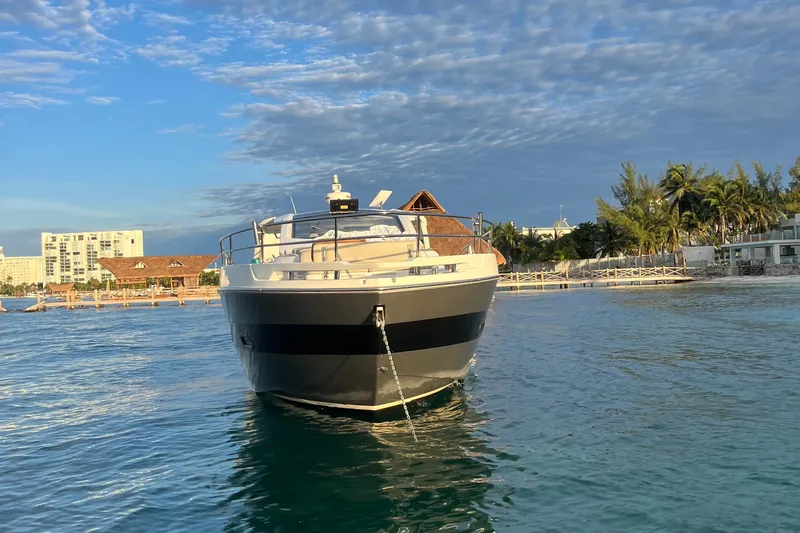 2017 Azimut Verve 40 @ Cancun Yacht Photos Pics Azimut Verve 40 yacht, 2017 model, anchored near a tropical shoreline.