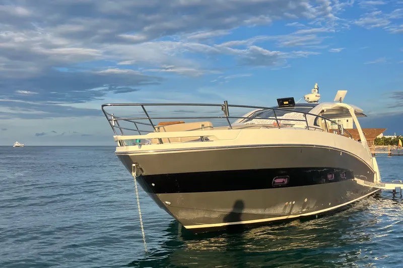 2017 Azimut Verve 40 @ Cancun Yacht Photos Pics 2017 Azimut Verve 40 yacht on calm water under a partly cloudy sky.