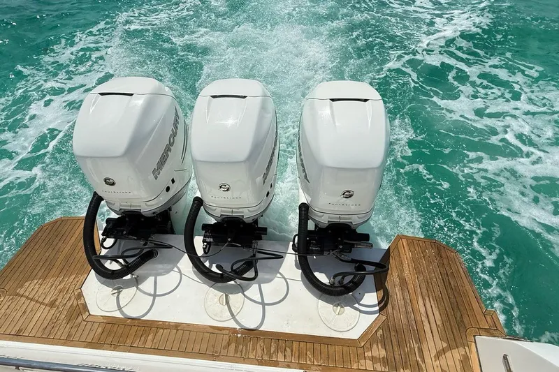 2017 Azimut Verve 40 @ Cancun Yacht Photos Pics Triple Mercury outboard engines on 2017 Azimut Verve 40 yacht in turquoise waters.