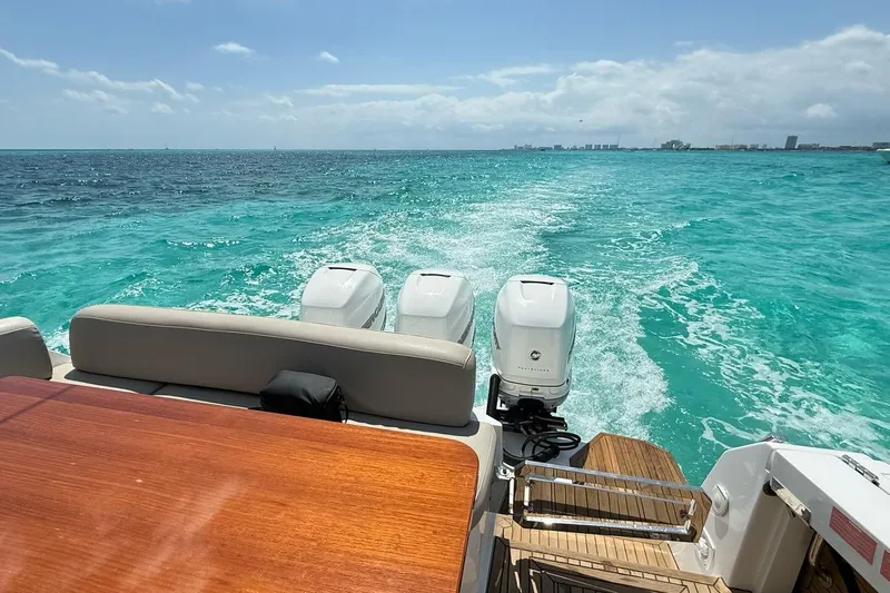 2017 Azimut Verve 40 @ Cancun Yacht Photos Pics Azimut Verve 40 yacht cruising on turquoise waters, showcasing powerful engines, 2017 model.