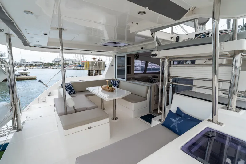 Everything Zen Yacht Photos Pics Luxurious 2017 Leopard 40 catamaran interior with modern seating and dining area.