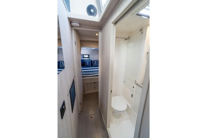 Everything Zen Yacht Photos Pics 2017 Leopard 40 yacht interior with compact bathroom and cozy cabin.