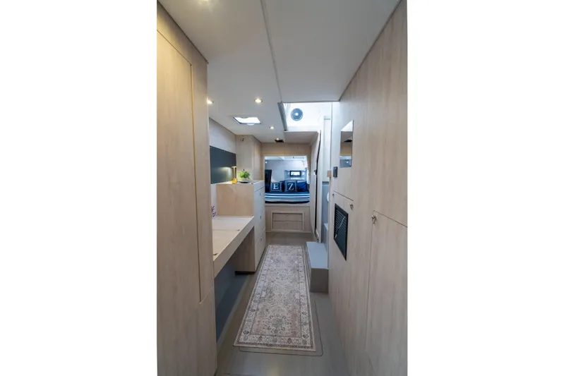 Everything Zen Yacht Photos Pics Modern interior of 2017 Leopard 40 yacht with sleek design and cozy decor.