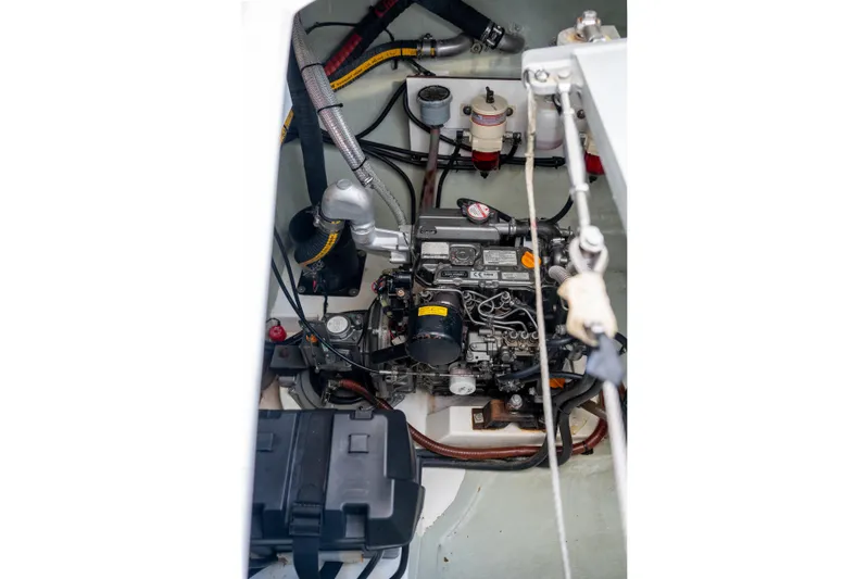Everything Zen Yacht Photos Pics Engine compartment of a 2017 Leopard 40 catamaran, showcasing detailed mechanical components.